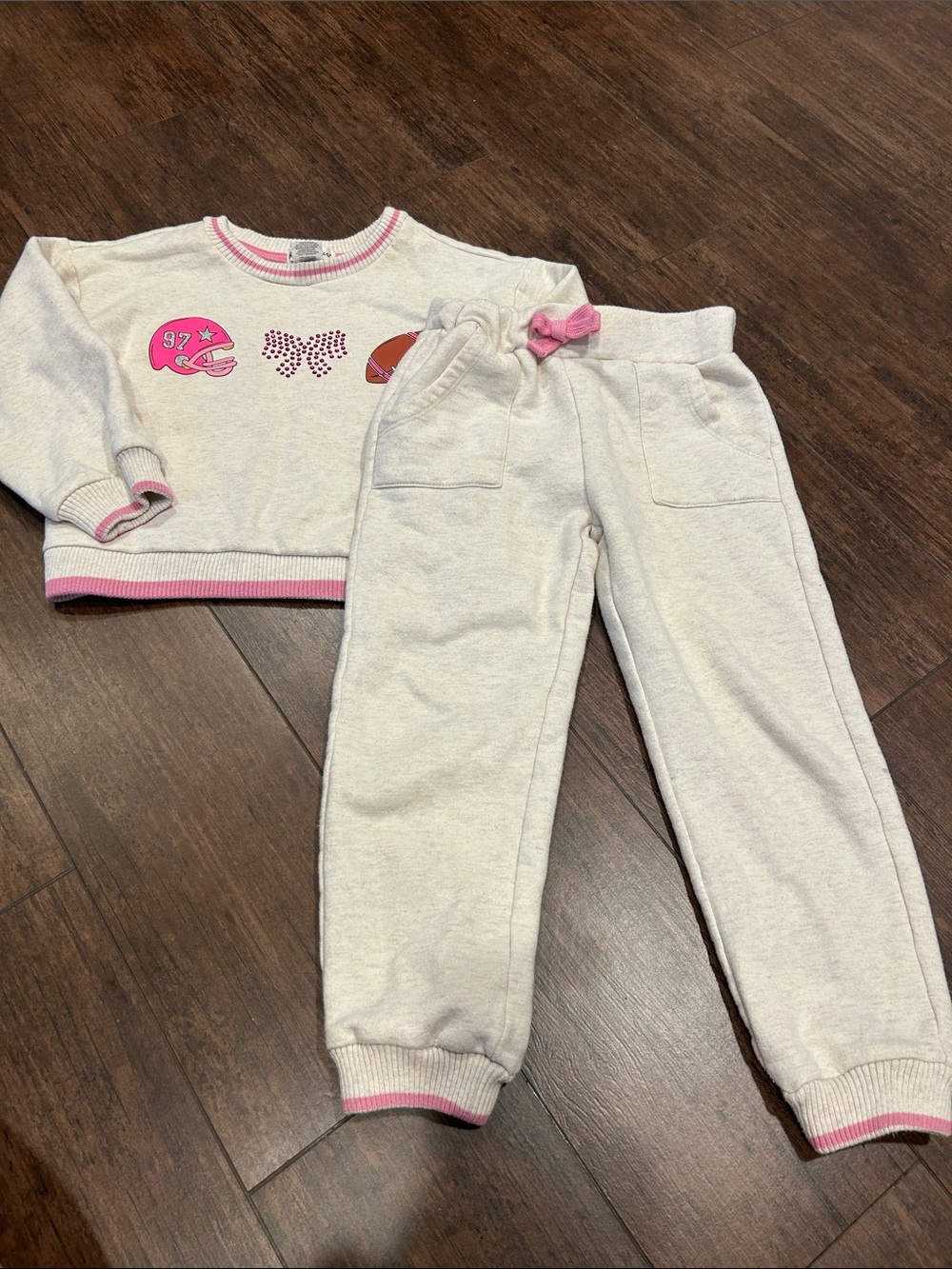 Football themed sweatshirt and sweat pants with pink accents